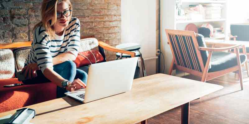 Woman is working on her laptop